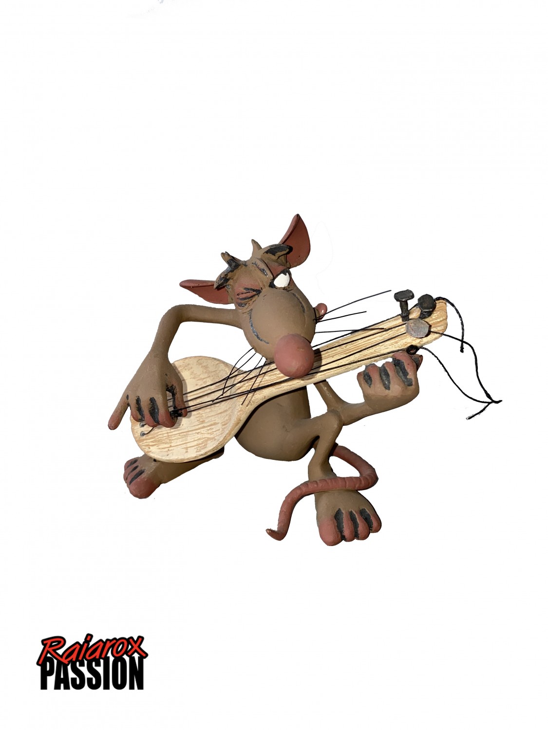 Le rat avec sa guitare