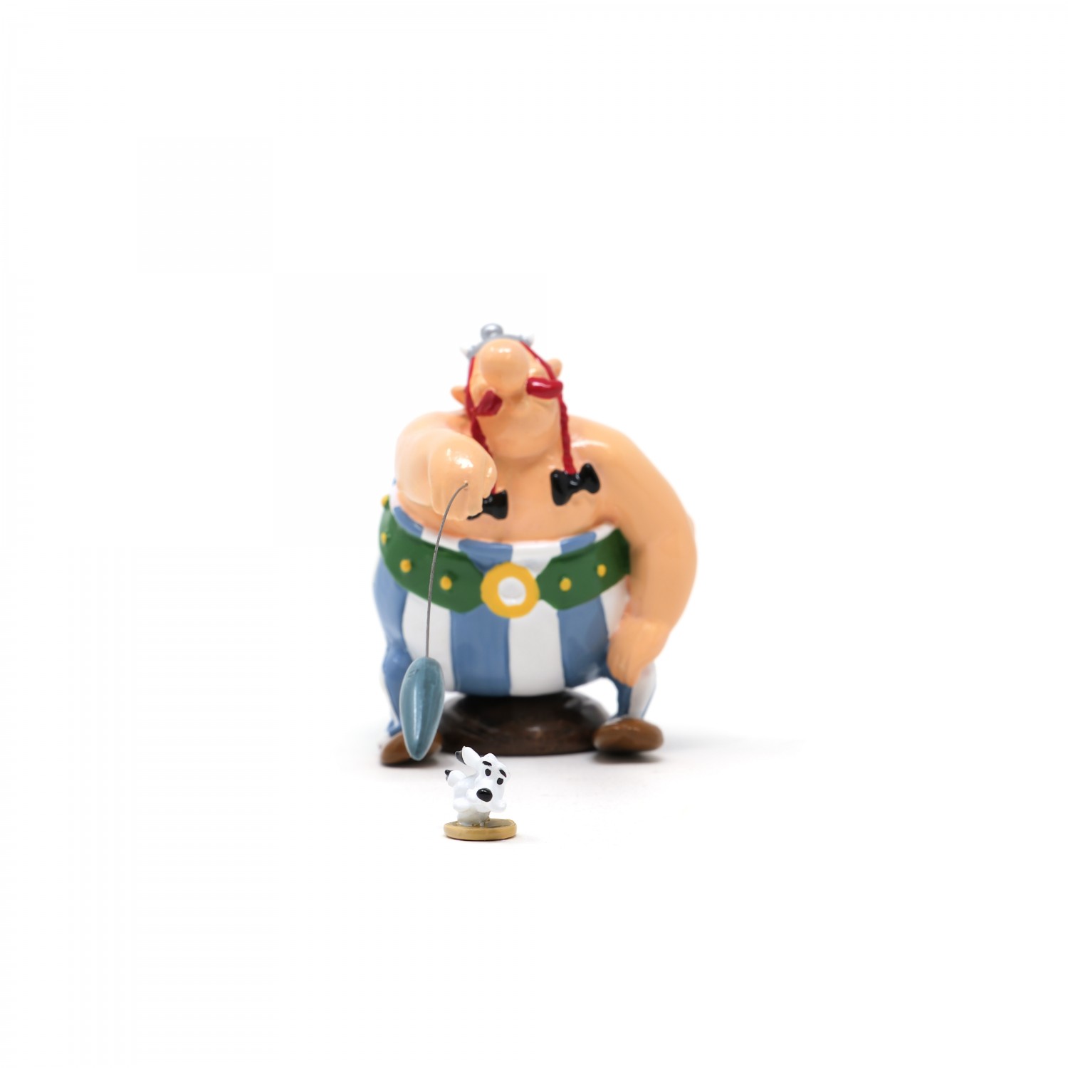 OBELIX LANCANT LE MINI MENHIR A IDEFIX