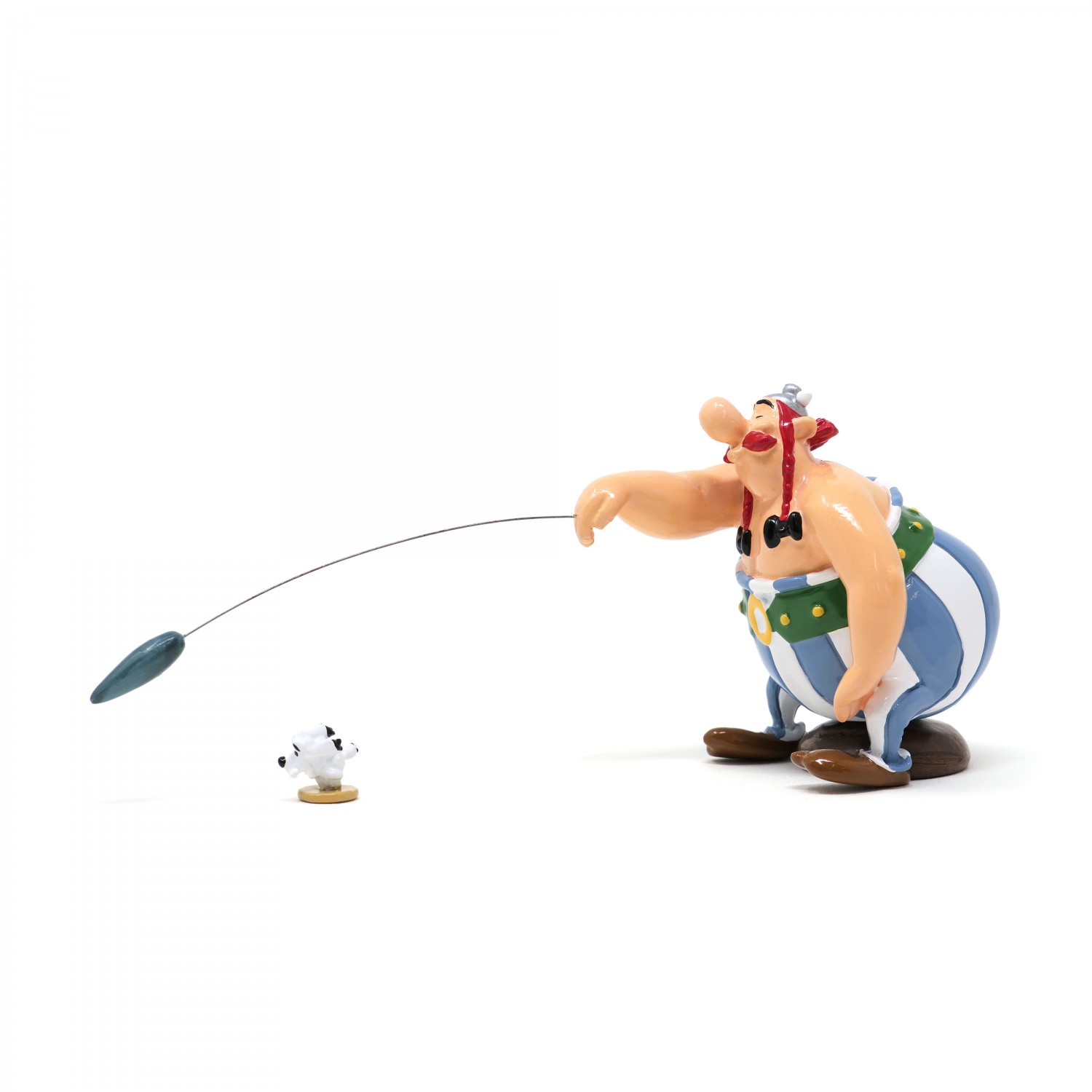 OBELIX LANCANT LE MINI MENHIR A IDEFIX