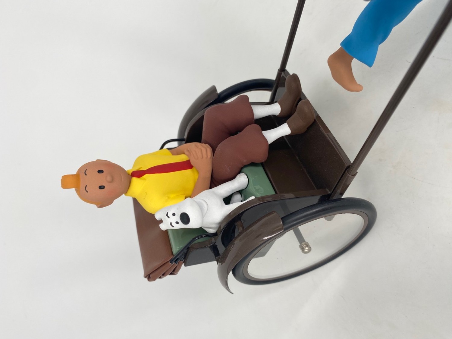 Tintin et le pousse-pousse - Le Lotus Bleu