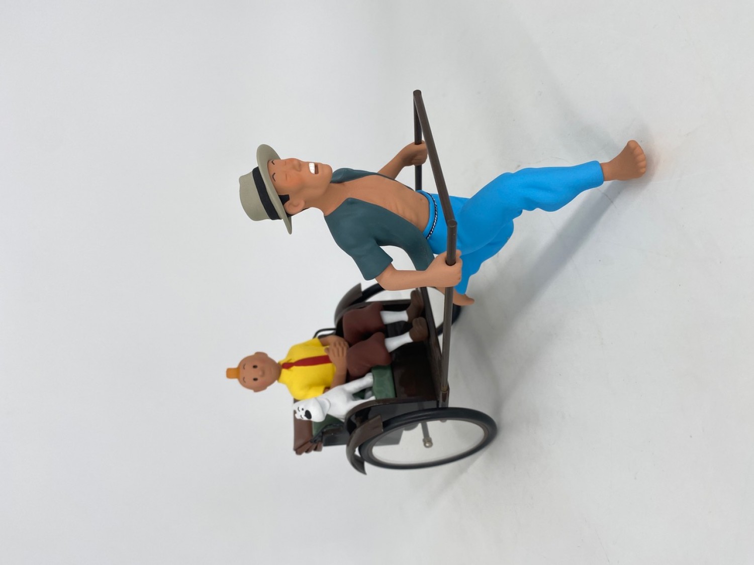 Tintin et le pousse-pousse - Le Lotus Bleu